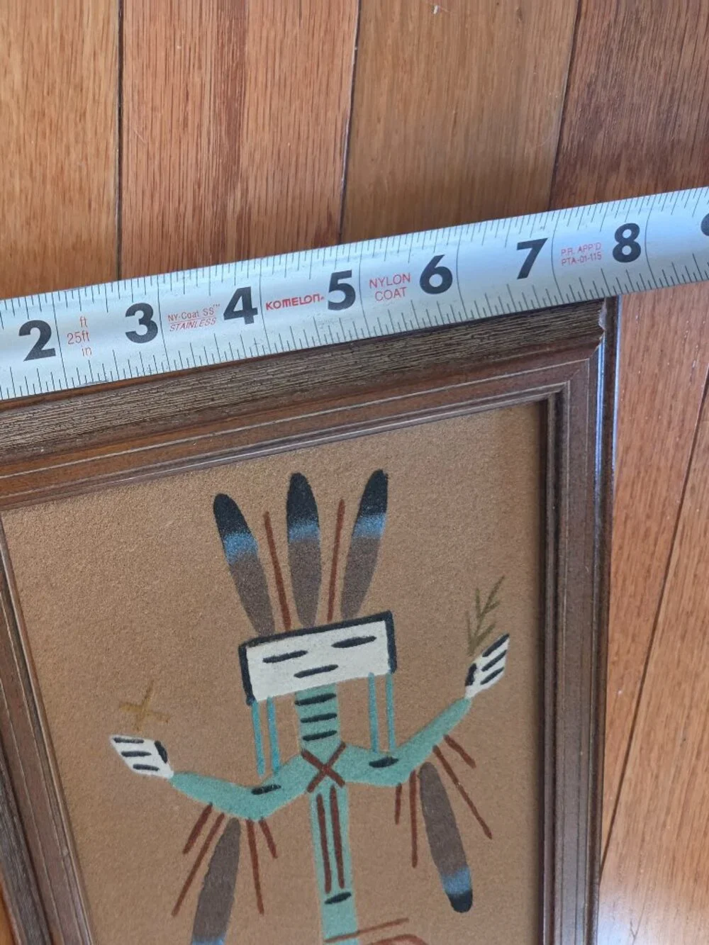 vintage Navajo sand art depicting Yei holy person figure framed